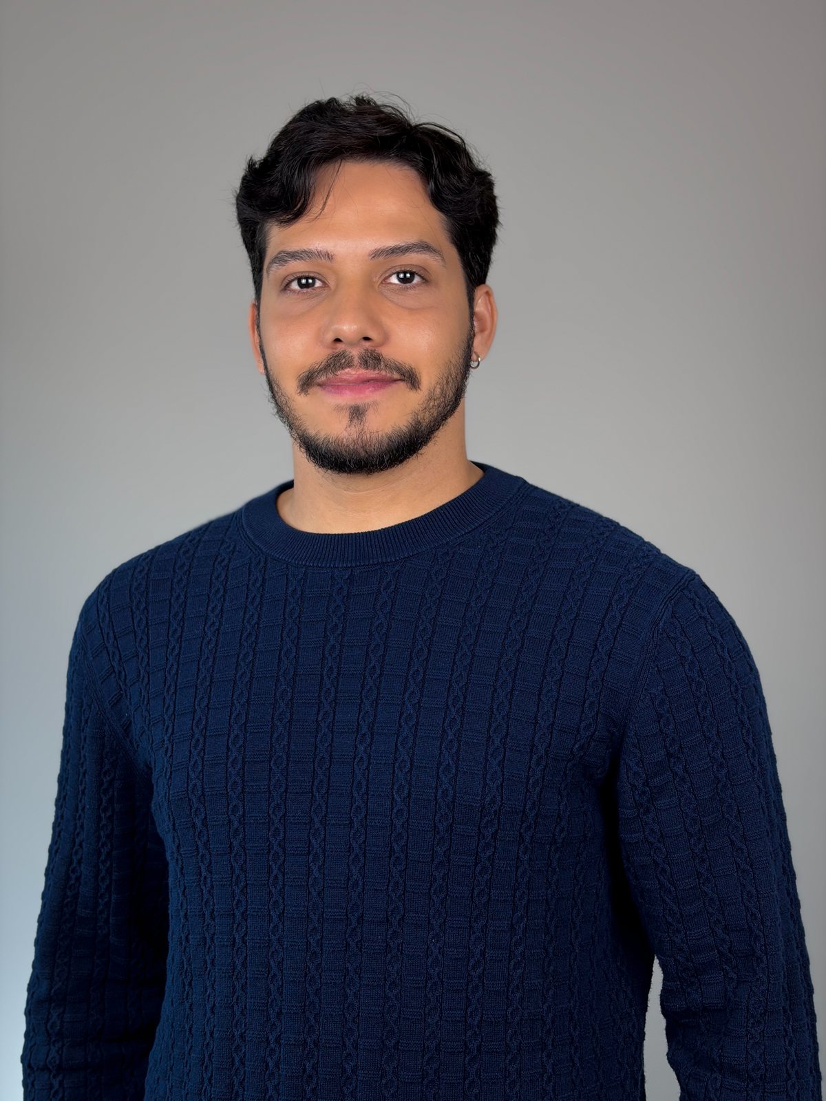 Bruno DiSanto, in a navy sweater