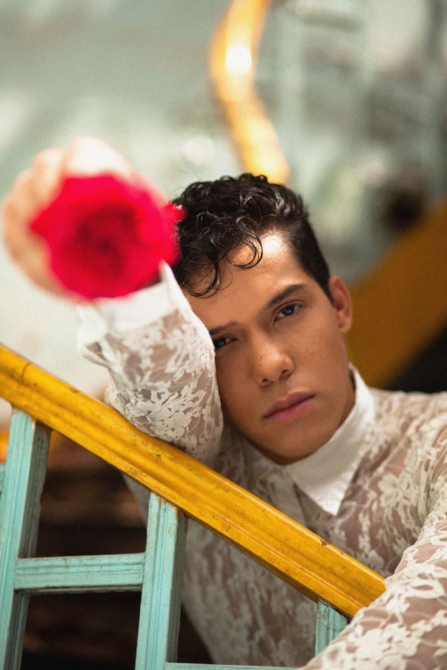 Bruno DiSanto, editorial in white lace with a red rose
