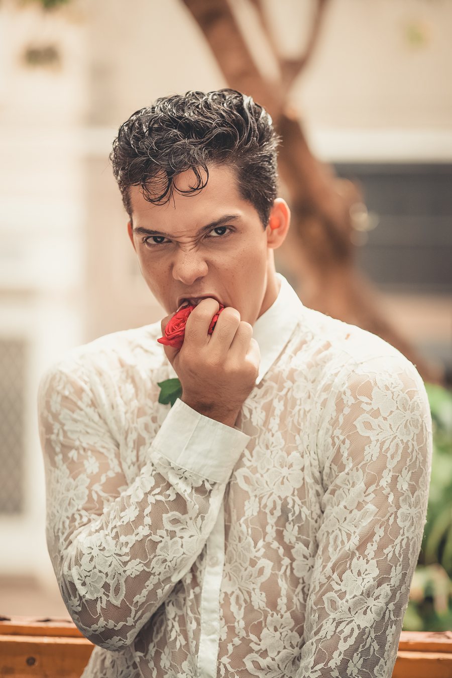 Bruno DiSanto, editorial in white lace holding a red rose